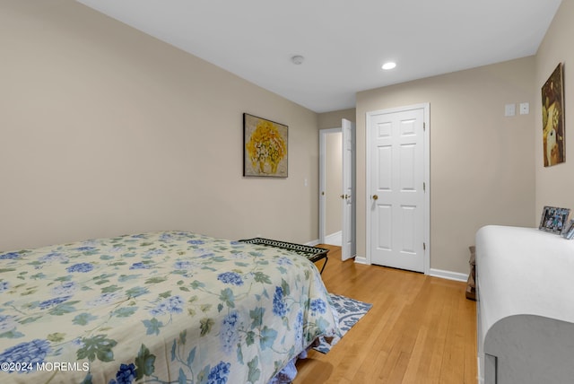 bedroom with light hardwood / wood-style floors