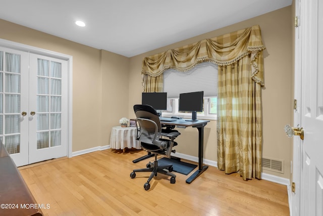 office area featuring wood-type flooring and french doors