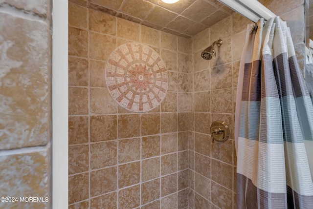 bathroom featuring walk in shower