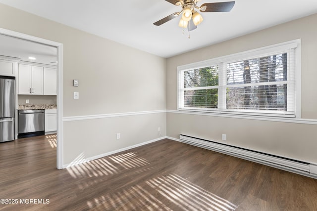 unfurnished room with a baseboard radiator, dark wood-type flooring, and ceiling fan