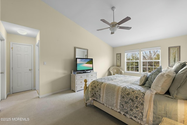 bedroom featuring lofted ceiling, light carpet, and ceiling fan