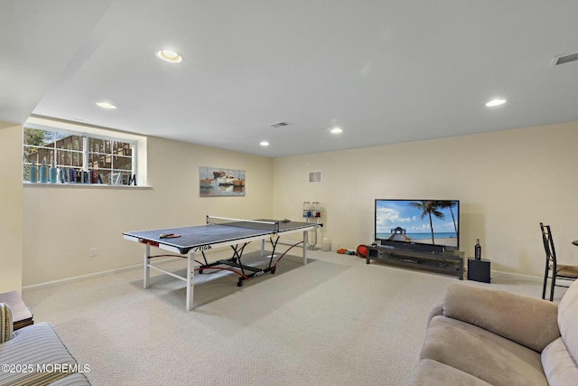 game room featuring light colored carpet