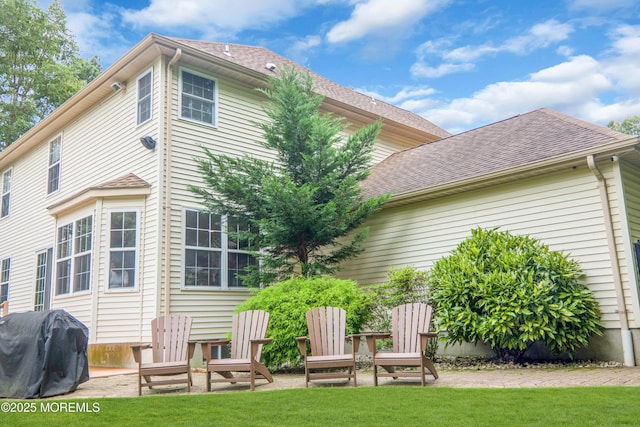 back of house with a patio area