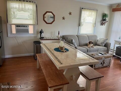 52 Fremont Ave Unit 3, Seaside Heights, NJ 08751 - living room featuring ornamental molding, wood finished floors, and cooling unit