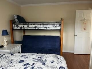 52 Fremont Ave Unit 3, Seaside Heights, NJ 08751 - bedroom featuring wood finished floors and crown molding