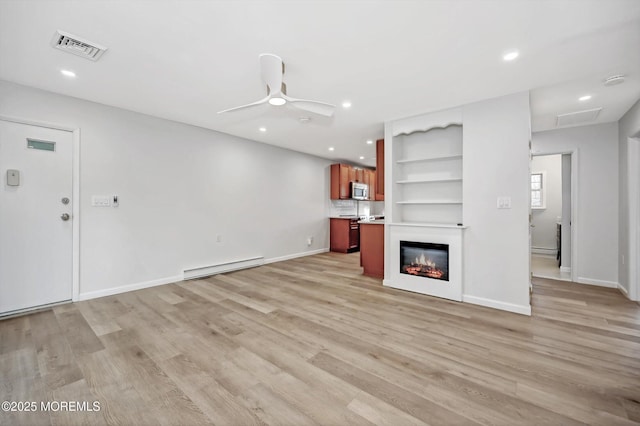 unfurnished living room with a baseboard radiator, recessed lighting, a ceiling fan, visible vents, and light wood-style floors