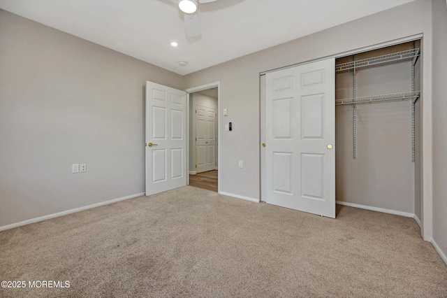 unfurnished bedroom featuring carpet floors, recessed lighting, a closet, ceiling fan, and baseboards