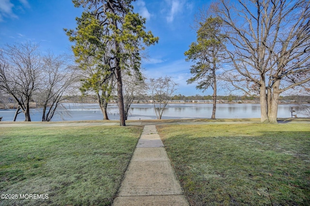 exterior space with a water view