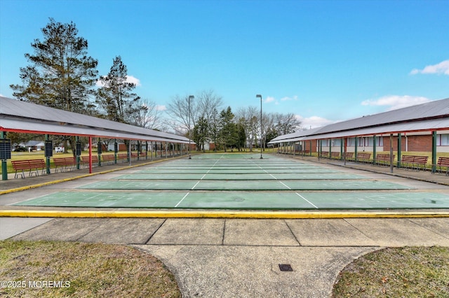 view of property's community with shuffleboard