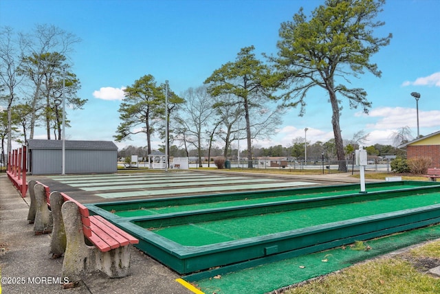 view of property's community with fence