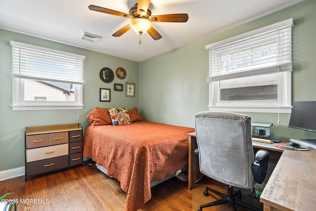 12 Edgewater Dr, Matawan, NJ 07747 - bedroom with dark wood-style flooring, a desk, and ceiling fan
