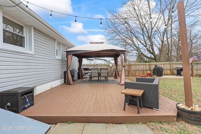 12 Edgewater Dr, Matawan, NJ 07747 - wooden terrace featuring outdoor dining space, a gazebo, a fenced backyard, and area for grilling