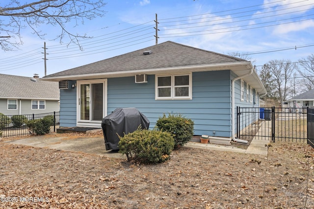 rear view of house featuring a patio