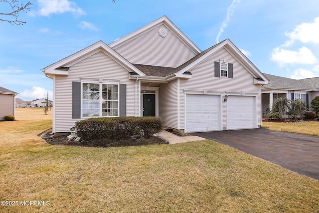 view of front facade featuring a garage and a front lawn