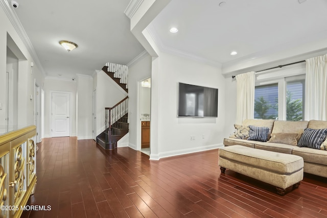 living room featuring ornamental molding and dark hardwood / wood-style floors