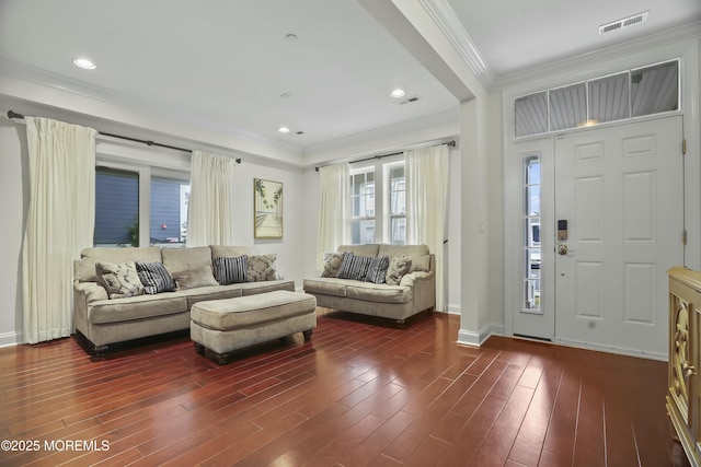 interior space with crown molding and dark hardwood / wood-style floors