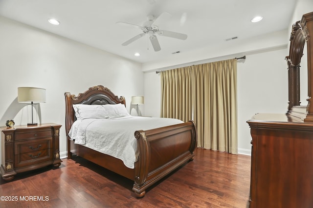 bedroom featuring dark wood-type flooring and ceiling fan