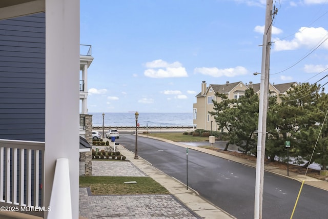 view of road featuring a water view