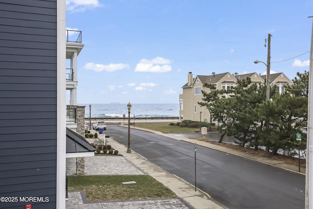 view of road featuring a water view