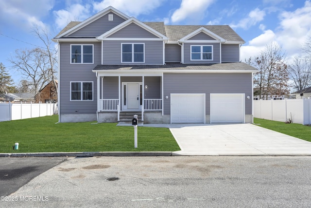 view of front facade with a garage, a front yard, and covered porch