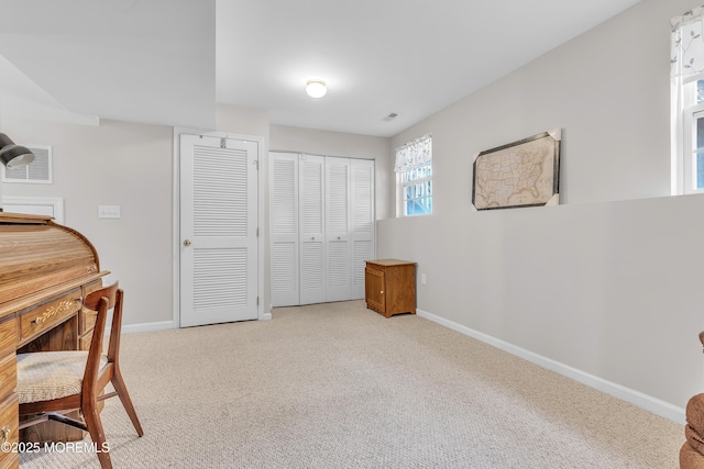 view of carpeted home office