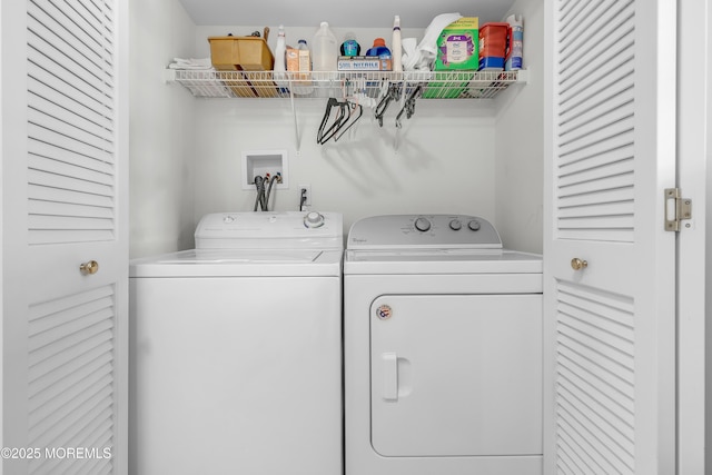 laundry area with independent washer and dryer