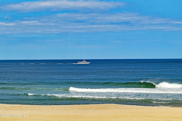 view of water feature with a view of the beach