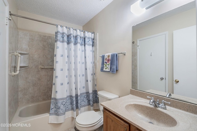 full bathroom featuring shower / tub combo with curtain, vanity, toilet, and a textured ceiling