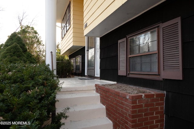 property entrance with a patio area