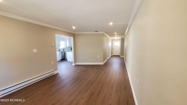 hall featuring dark hardwood / wood-style flooring, crown molding, and a baseboard radiator