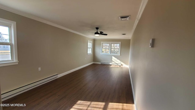 spare room with dark wood-type flooring, a baseboard radiator, crown molding, and ceiling fan