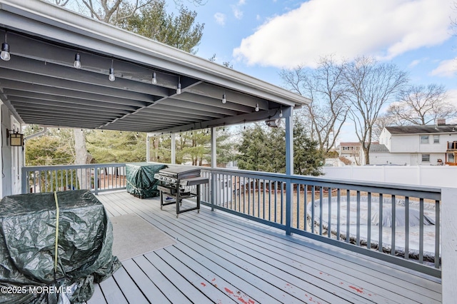 wooden terrace with grilling area