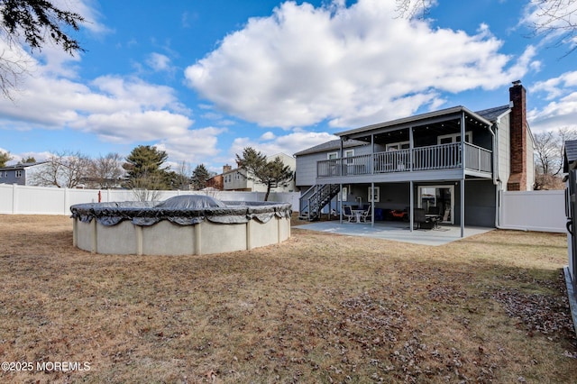 view of yard with a patio and a pool side deck