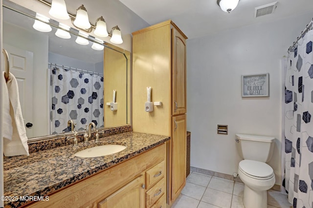 bathroom with tile patterned flooring, vanity, toilet, and a shower with shower curtain