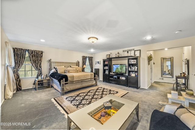 carpeted bedroom featuring recessed lighting and baseboards