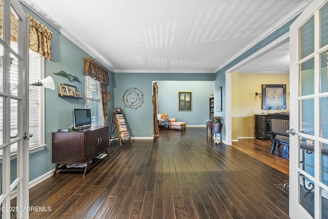 home office with french doors, wood finished floors, and baseboards