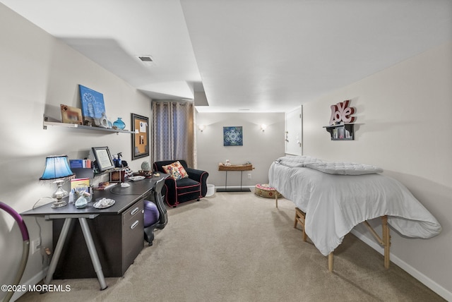 bedroom with visible vents, light carpet, and baseboards