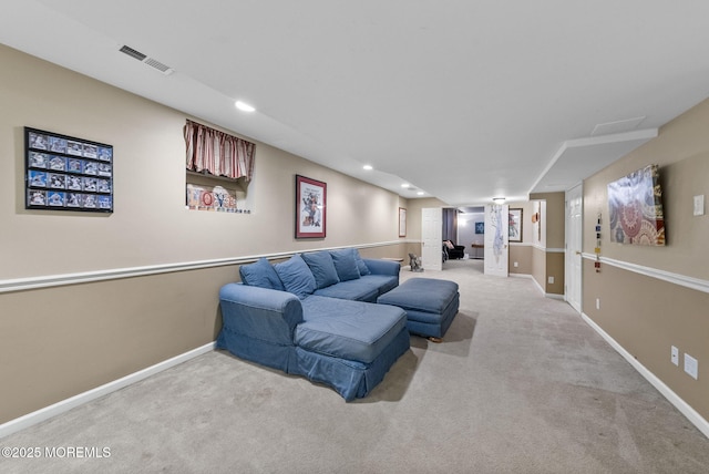 carpeted living room featuring baseboards, visible vents, and recessed lighting