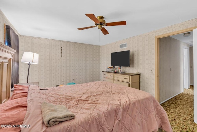 bedroom featuring ceiling fan and carpet flooring