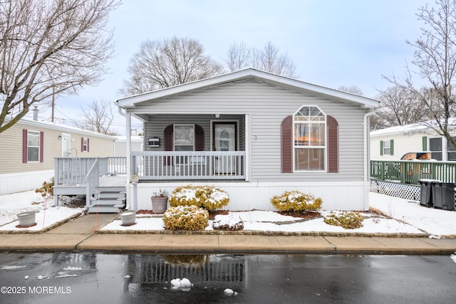 view of front of home featuring covered porch