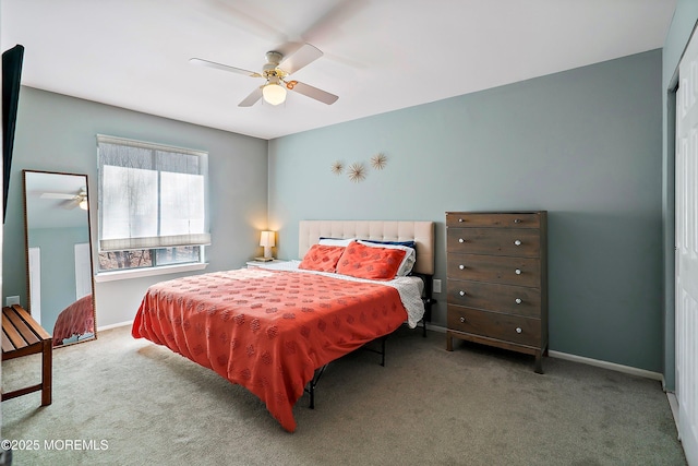 bedroom with carpet flooring, ceiling fan, and baseboards