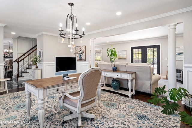 office area featuring ornate columns, a notable chandelier, and french doors