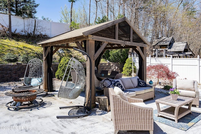 view of patio with a gazebo and outdoor lounge area