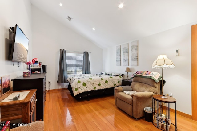 bedroom featuring high vaulted ceiling, recessed lighting, visible vents, baseboards, and light wood-type flooring