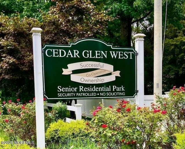 view of community sign