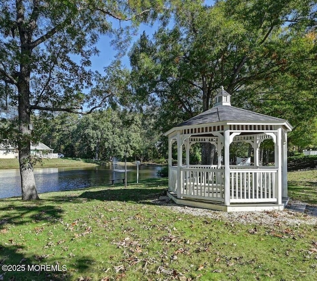 view of yard with a water view and a gazebo