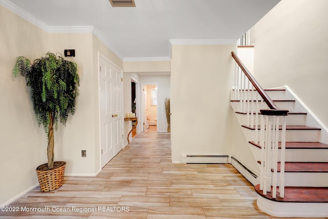 stairway with ornamental molding, wood tiled floor, and a baseboard radiator