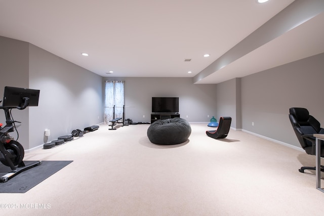 workout area with light colored carpet