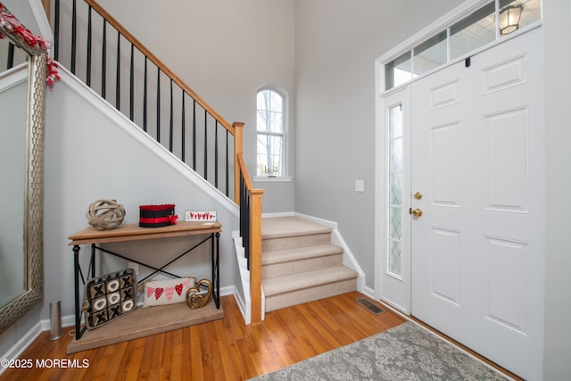 foyer with hardwood / wood-style floors