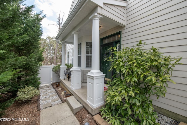 entrance to property featuring covered porch